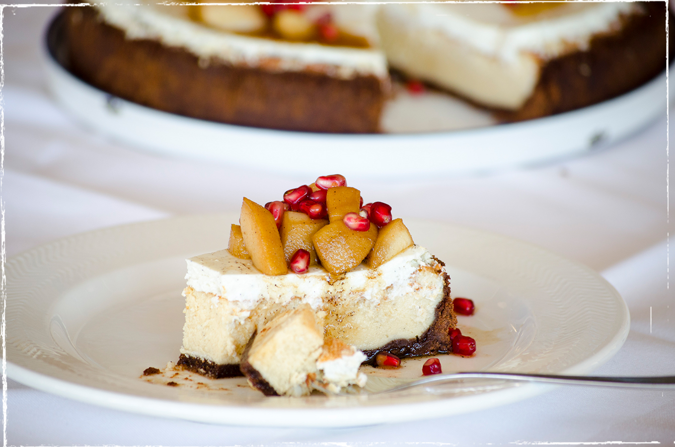 Cheese cake with goat´s milk cheese, poached pears and pomegranate seeds